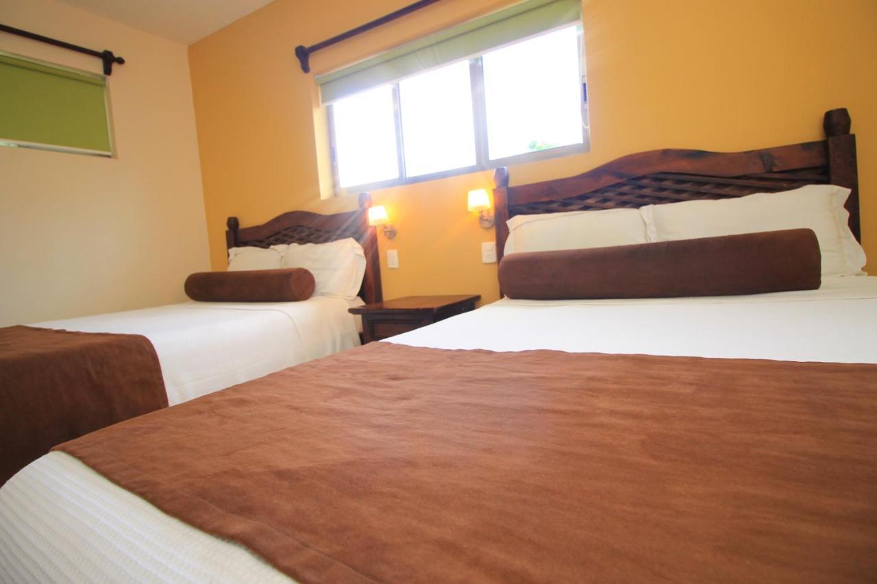 Papagayo Hotel Boutique Плая-дель-Кармен Экстерьер фото A room at the hotel