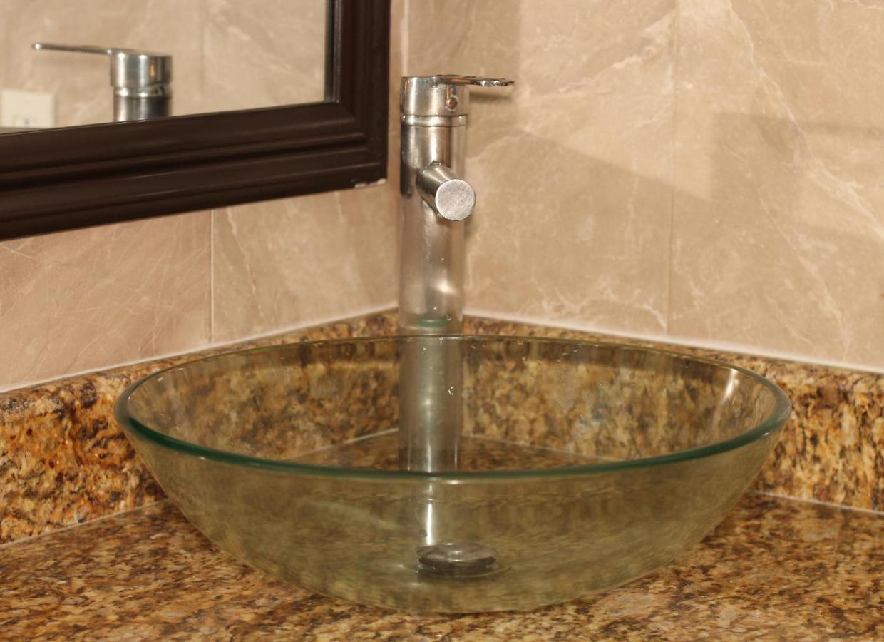 Papagayo Hotel Boutique Плая-дель-Кармен Экстерьер фото A vessel sink